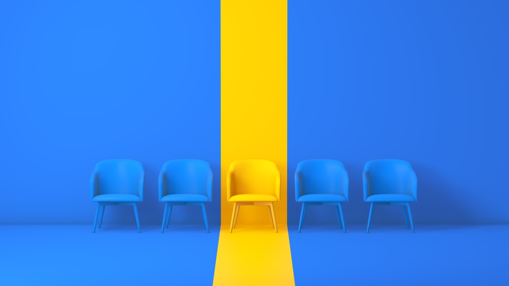 A,Yellow,Chair,That,Stands,Out,From,The,Chairs,Crowd